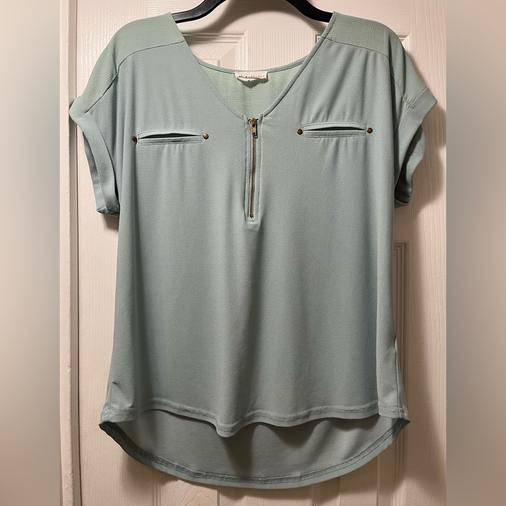 Light grayish green short sleeve blouse with front zipper